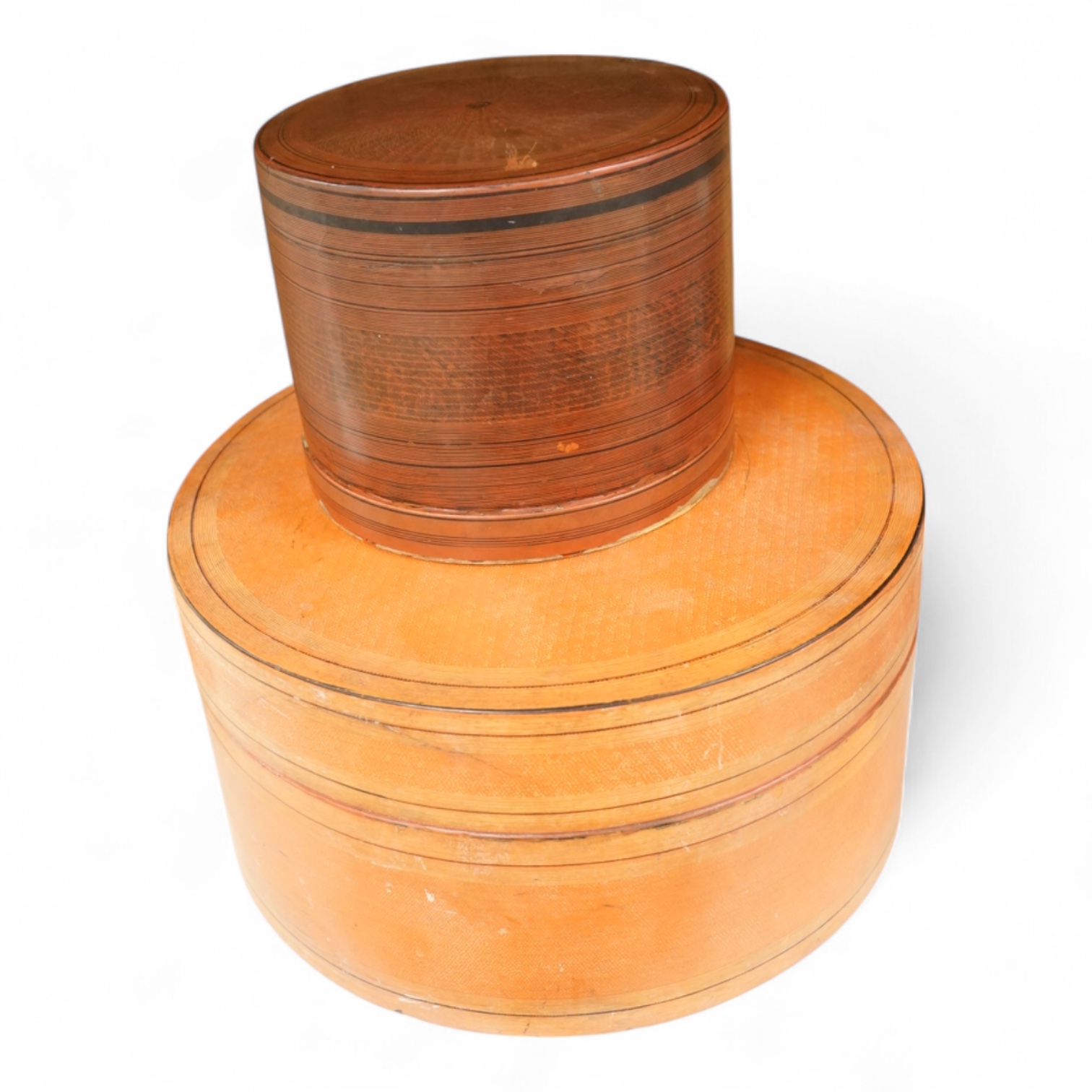 Two 19th century Burmese lacquered cylindrical boxes, largest 27cm in diameter